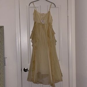 Ivory butter colored dress w/tags and never worn